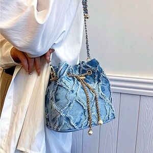 Blue Denim Drawstring Bucket Crossbody Bag with Gold Chain